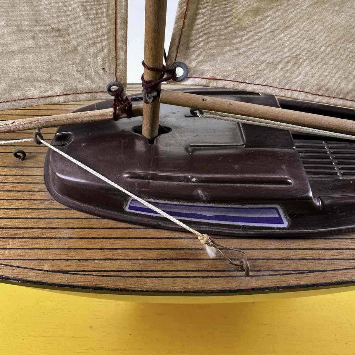 Vintage Toy Sailboat Monsun photo vinterior