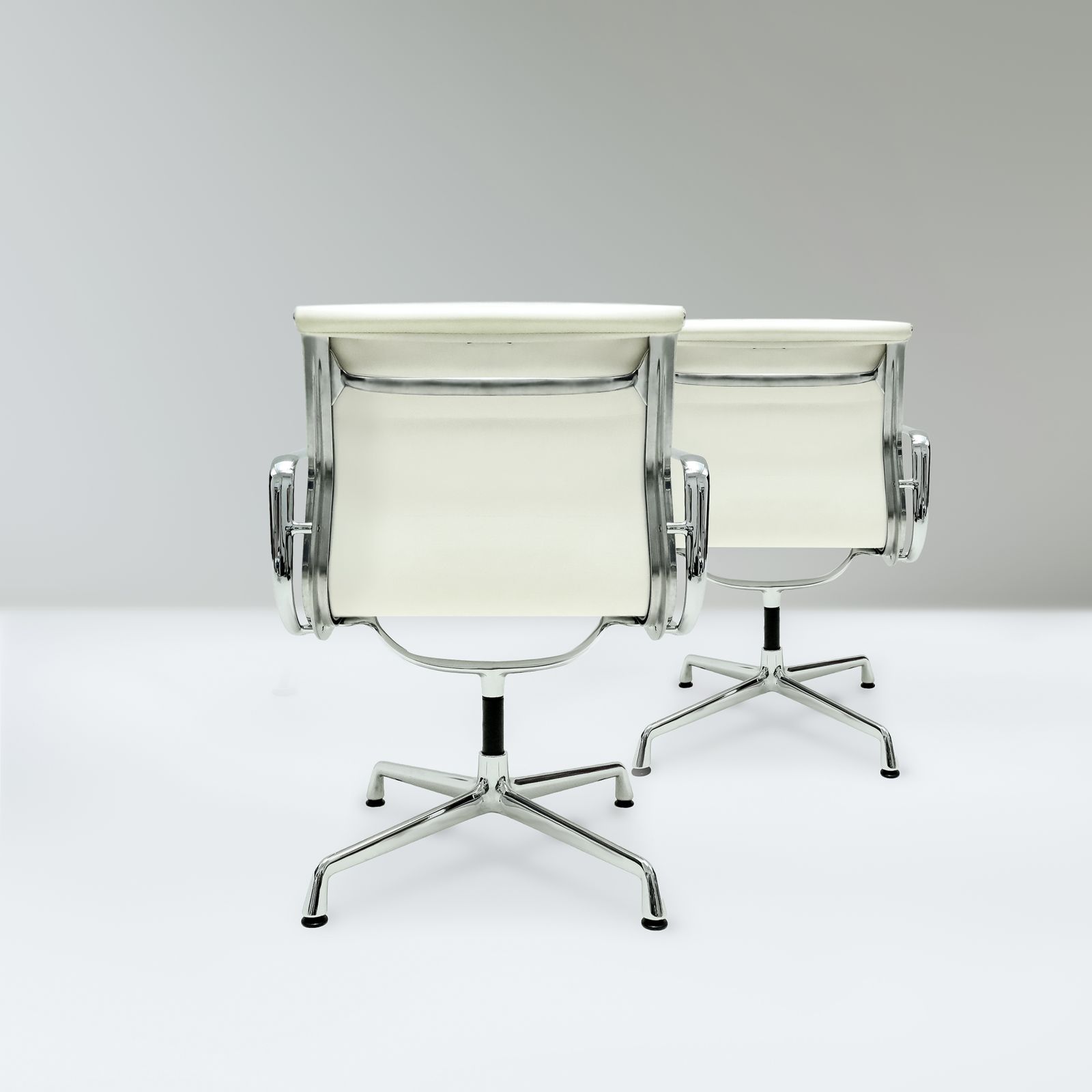 Original Vitra, Eames Ea208 Ivory Leather And Chrome Soft Pad Chairs With Revolving Bases   Two Available photo Furniture