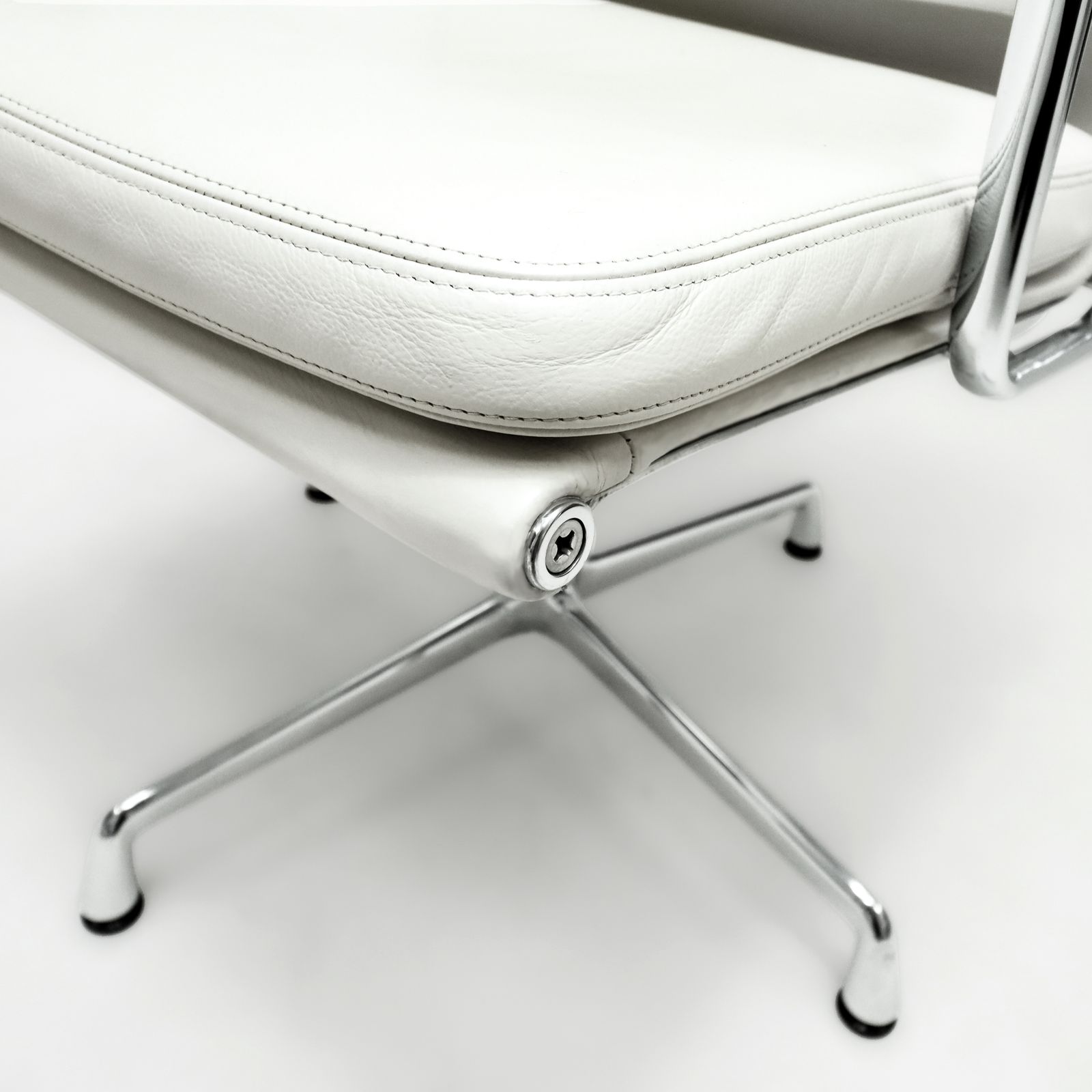 Original Vitra, Eames Ea208 Ivory Leather And Chrome Soft Pad Chairs With Revolving Bases   Two Available photo vinterior