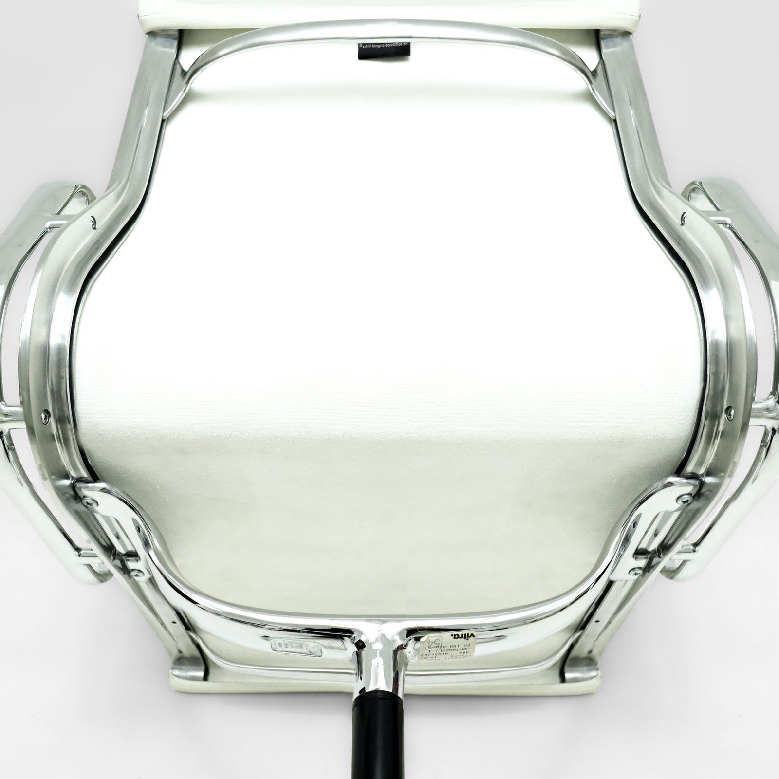 photo furniture Original Vitra, Eames Ea208 Ivory Leather And Chrome Soft Pad Chairs With Revolving Bases   Two Available
