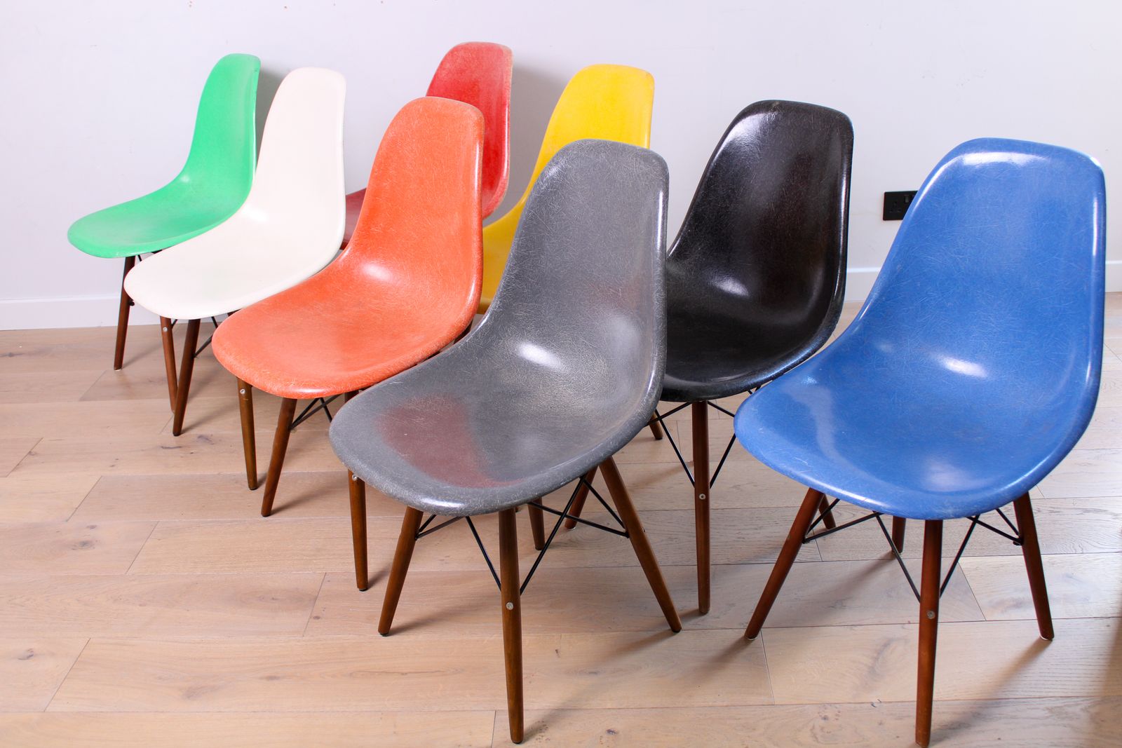 A Mixed (Harlequin) Set Of 8 Original Herman Miller Fiberglass Eames Dsw Chairs photo for sale