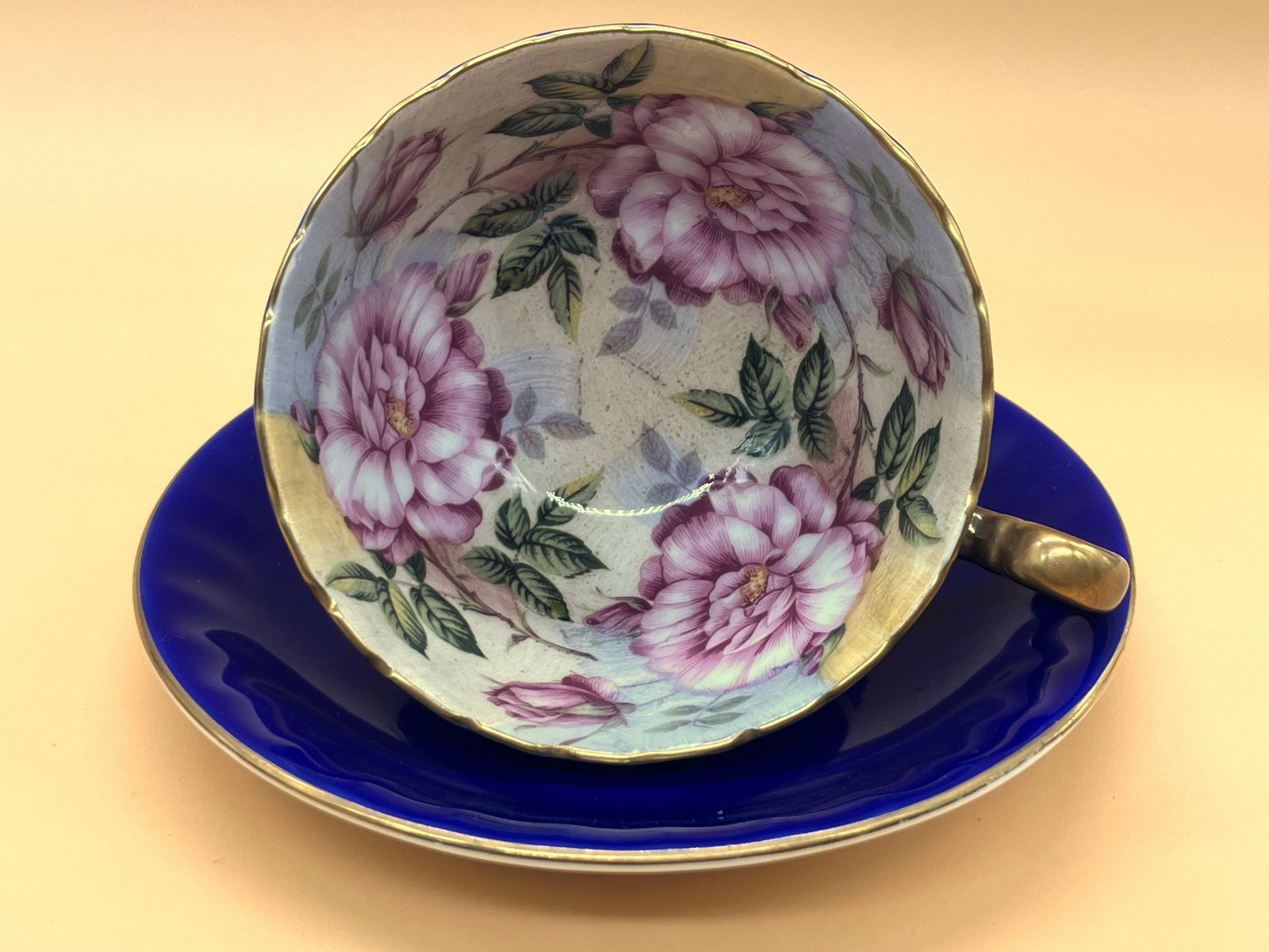 Aynsley China Cabbage Rose Cobalt Blue And Gold Footed And Fluted Cabinet Tea Cup & Saucer Duo.