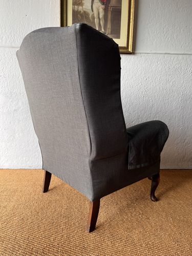 Large Comfortable Antique Wingback Chair With Clean Grey Coloured Loose Covers photo buy