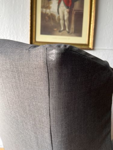Large Comfortable Antique Wingback Chair With Clean Grey Coloured Loose Covers photo vintage