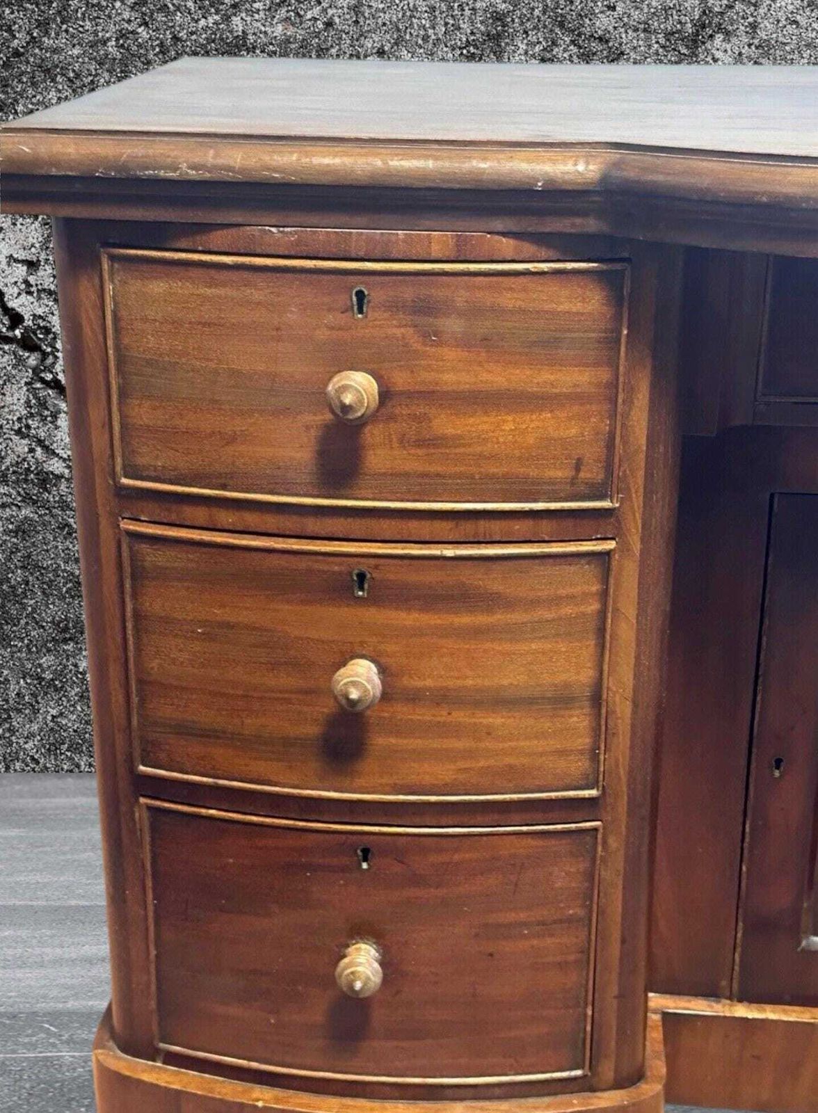 photo for sale Late Victorian One Piece Mahogany Bow Breakfront Six Drawer Kneehole Desk