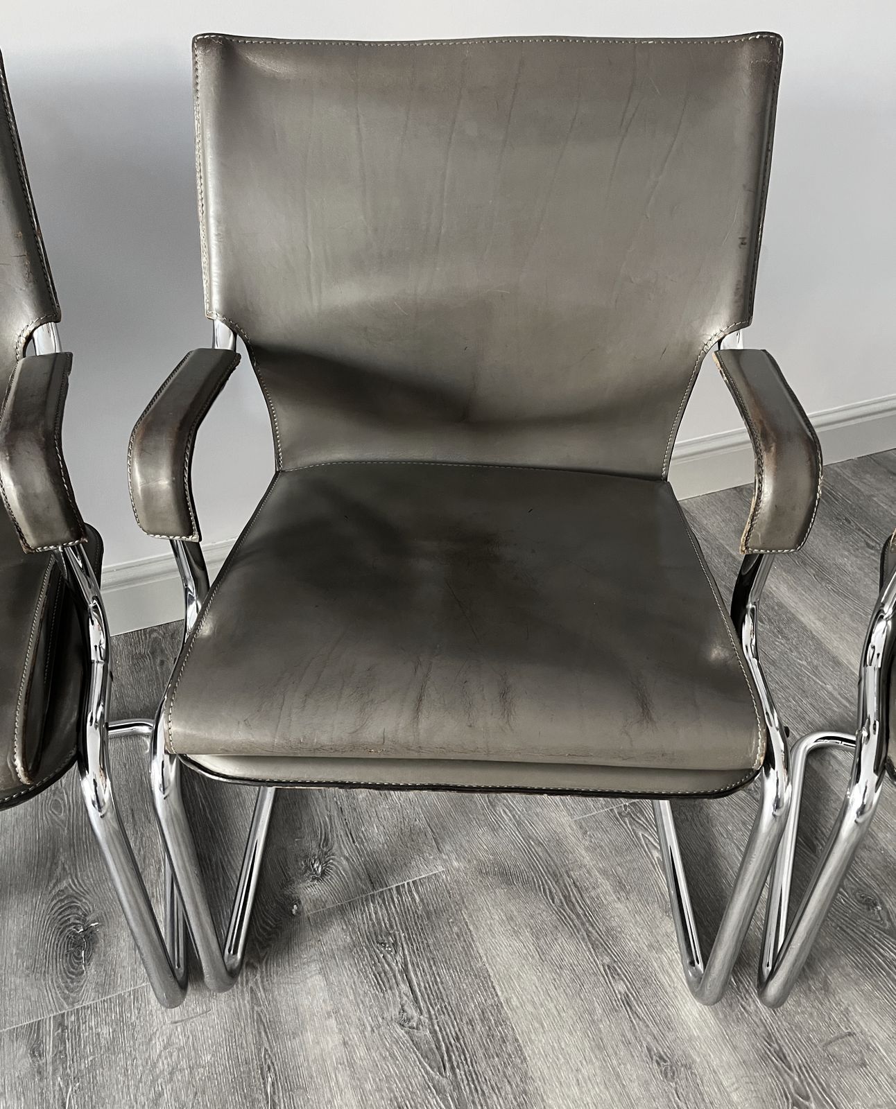 Set Of 6 Iconic Uno Chairs In Hand Stitched Heavy Grey Leather On Tubular Chrome Metal Cantilevered Frames. photo vinterior