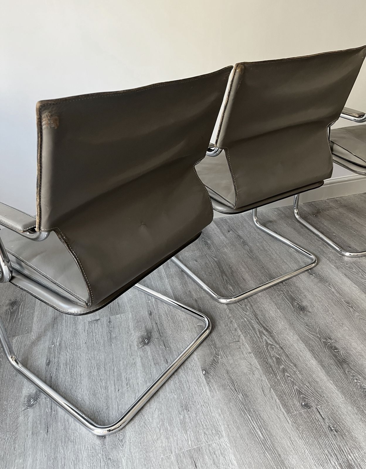 Furniture Set Of 6 Iconic Uno Chairs In Hand Stitched Heavy Grey Leather On Tubular Chrome Metal Cantilevered Frames. photo