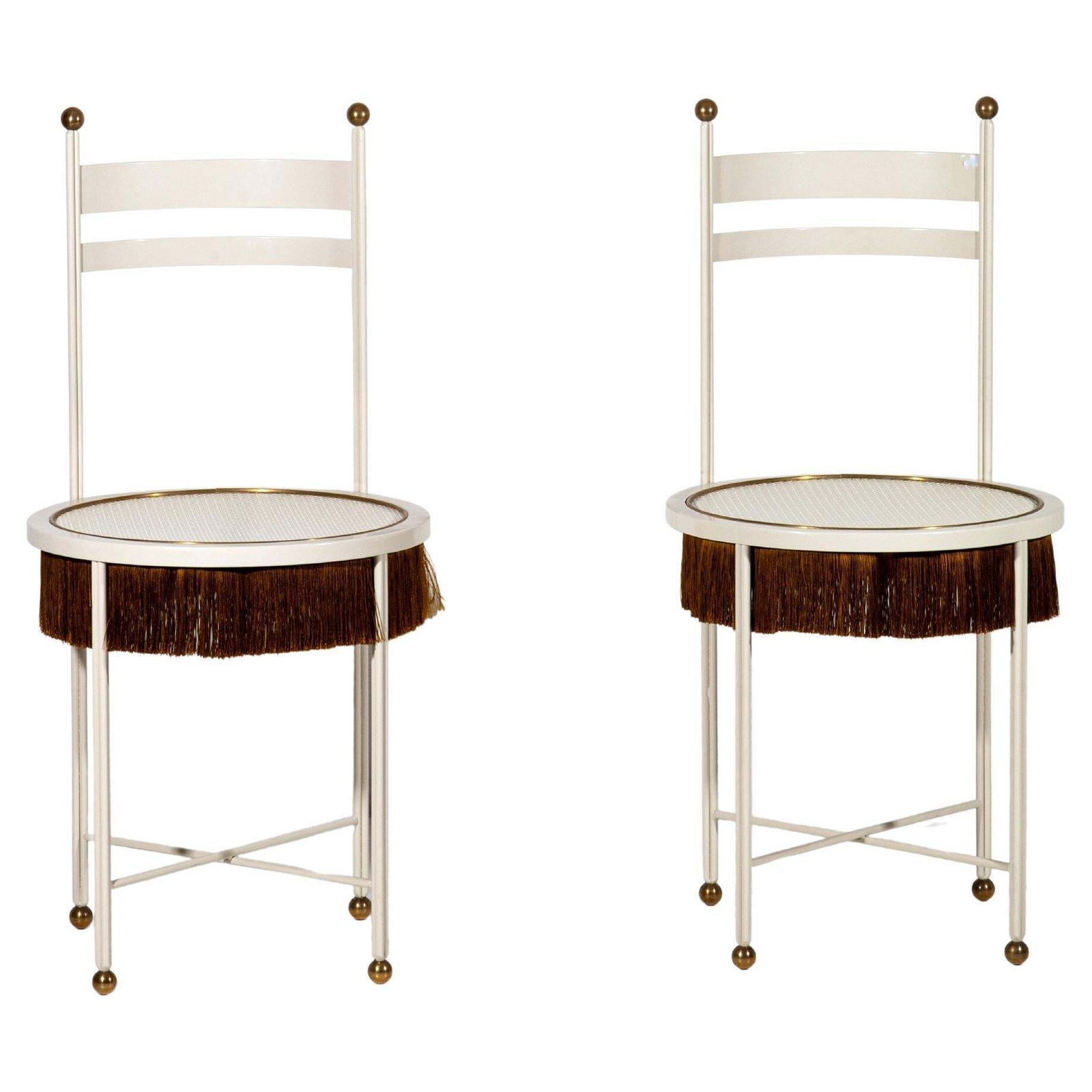 Paris Of White Chairs With Fringes