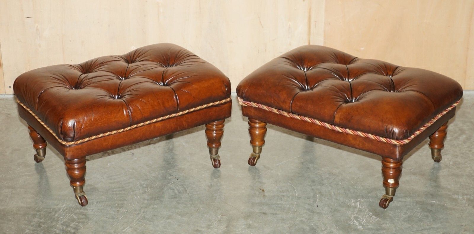 Pair Of Restored Brown Leather Chesterfield Tufted Porcelain Castors Footstools