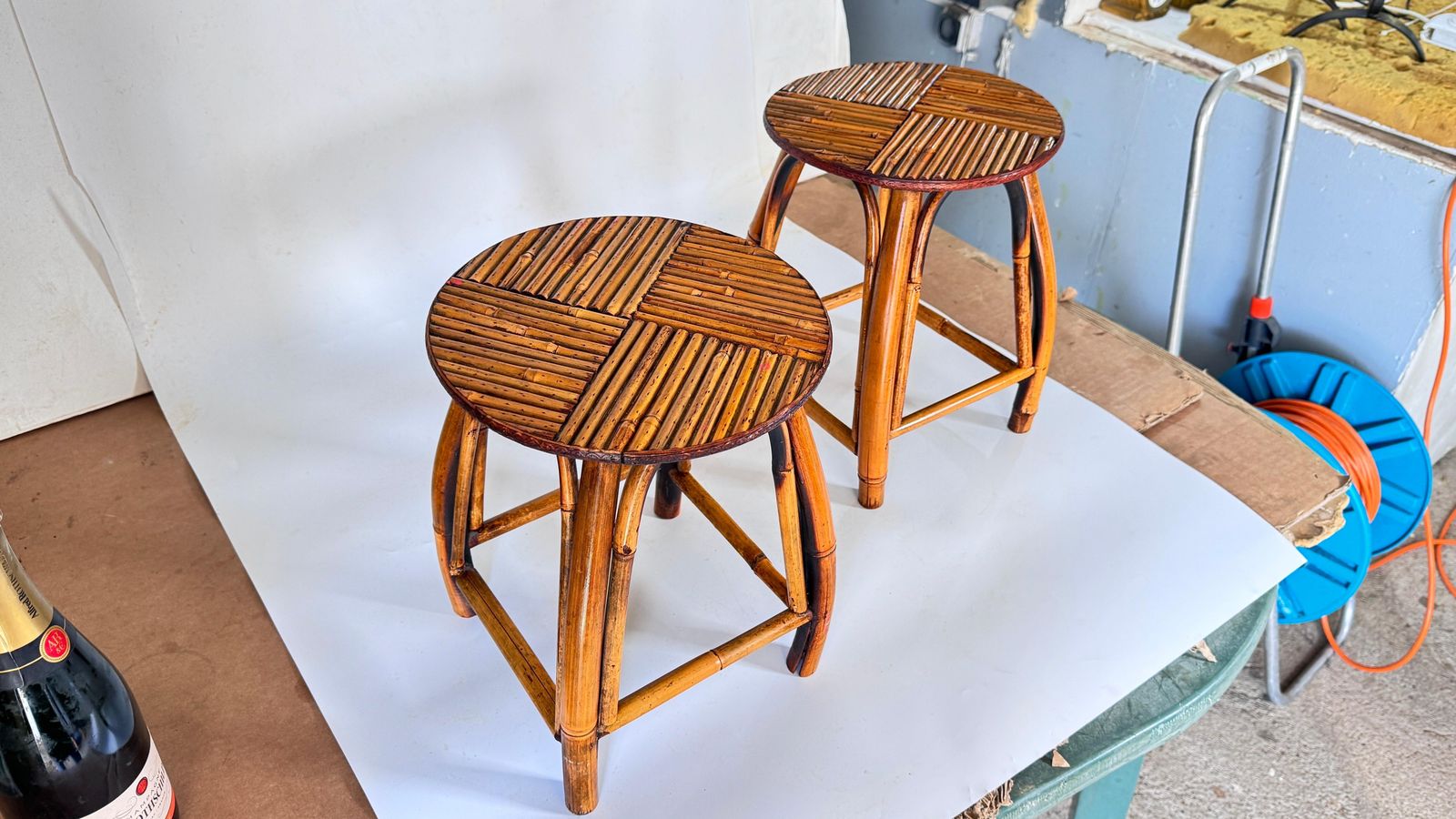 photo vintage Pair Of 1950s French Riviera Stools, Woven Rattan And Bamboo, Vibrant Geometric