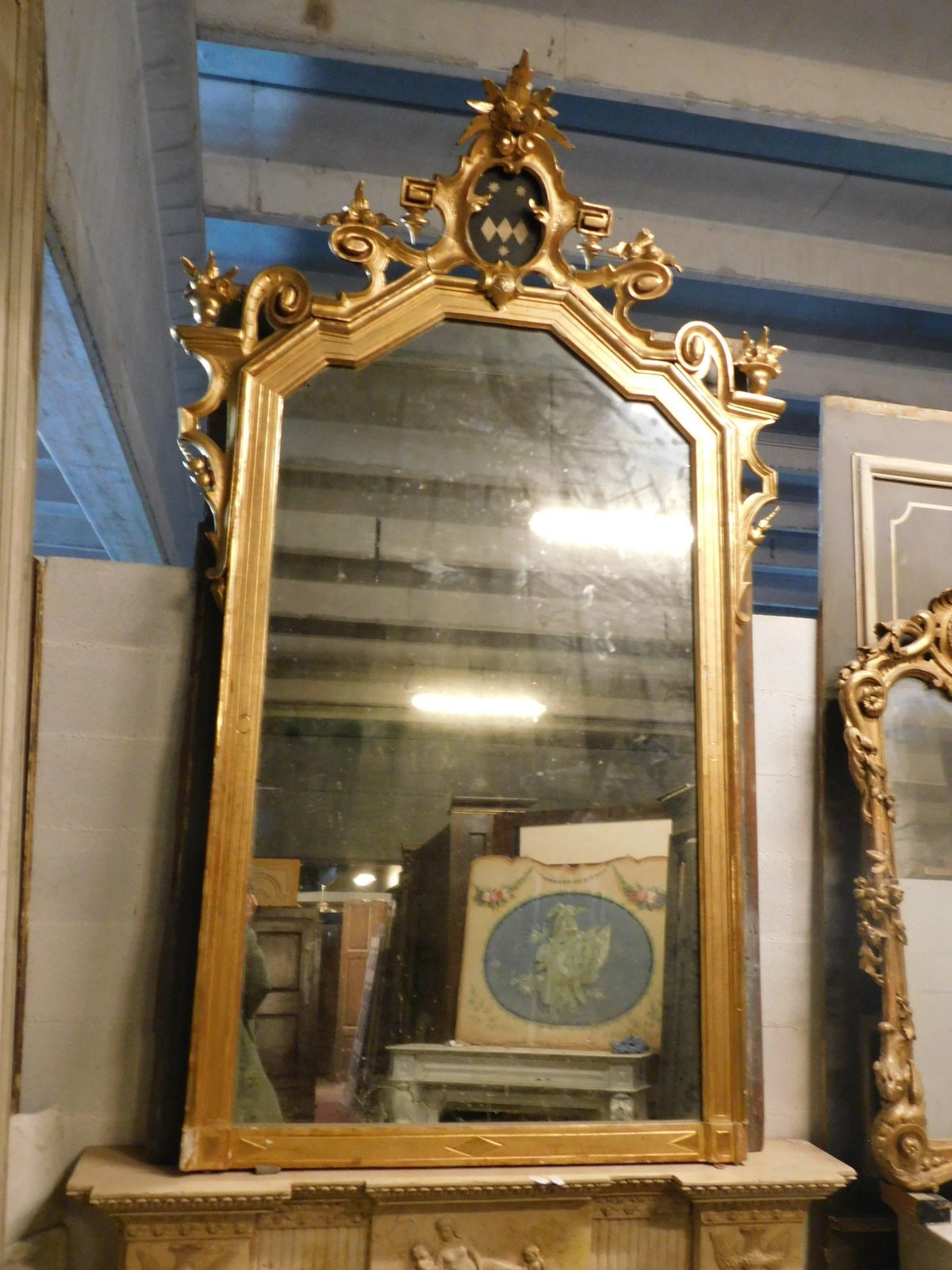 Large Gilded Wooden Mirror With Carved Top Centered By A Coat Of Arms, Italy photo furniture