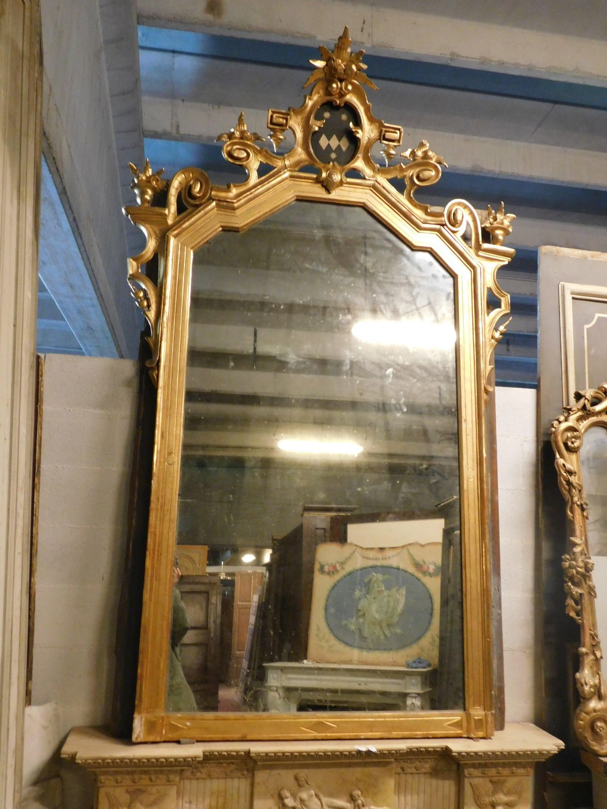 Large Gilded Wooden Mirror With Carved Top Centered By A Coat Of Arms, Italy photo for sale