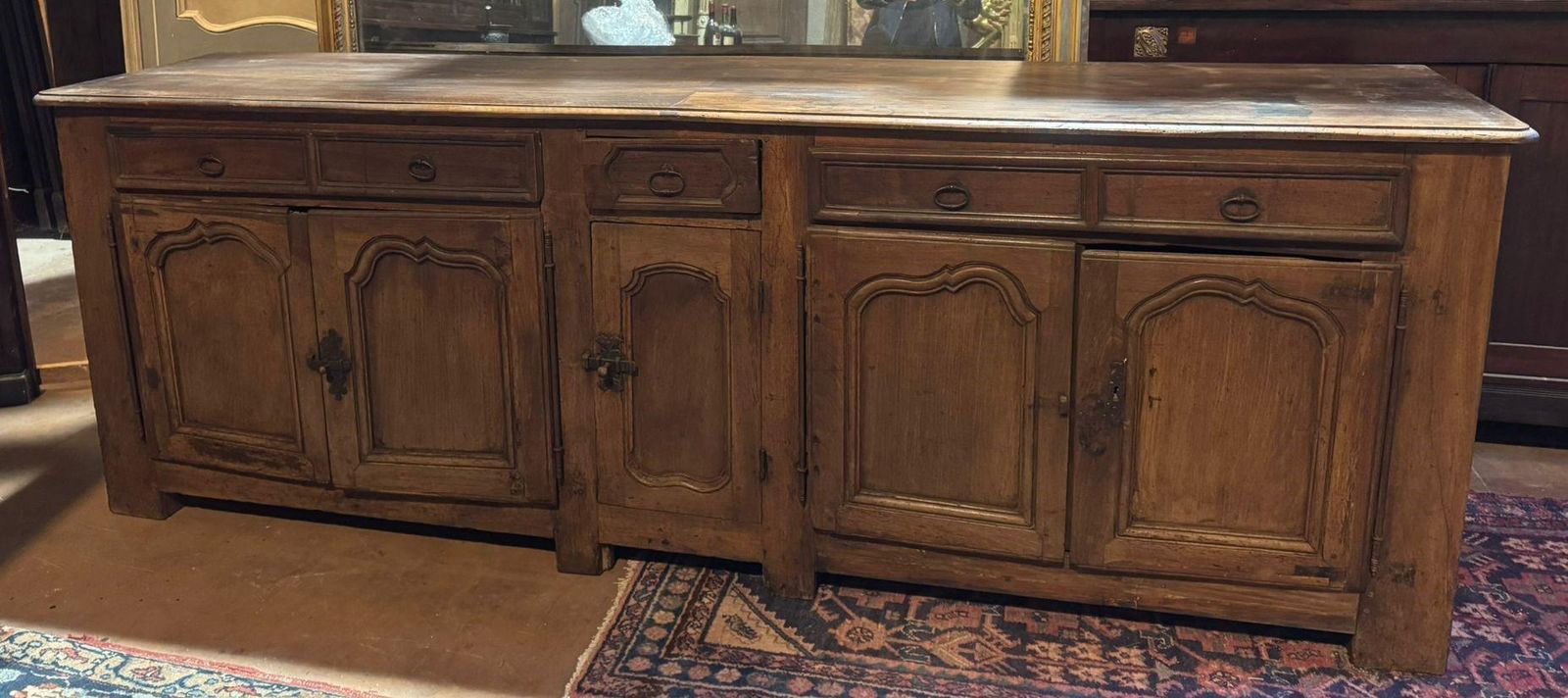 Low Sideboard In Walnut Wood, Five Carved Panel Doors And Five Drawers, France photo vintage
