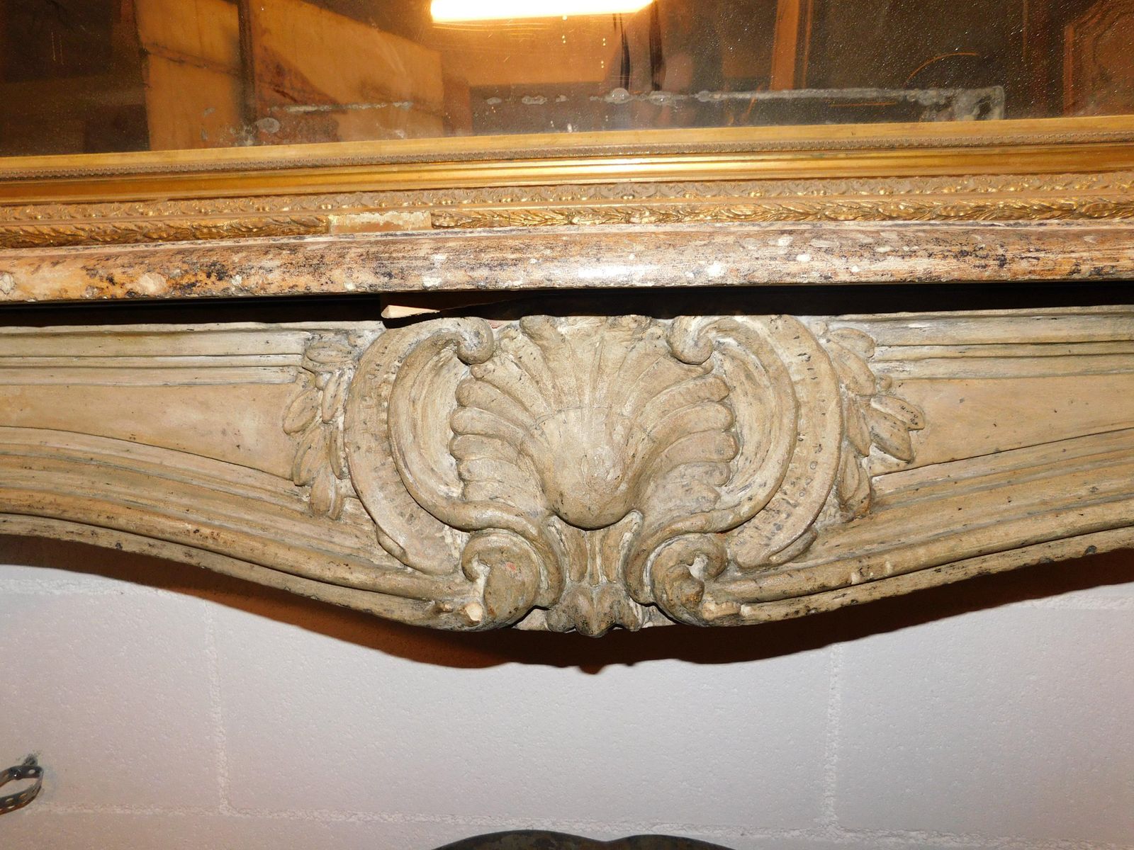 Fireplace Mantle In Carved Burgundy Stone, France photo vinterior
