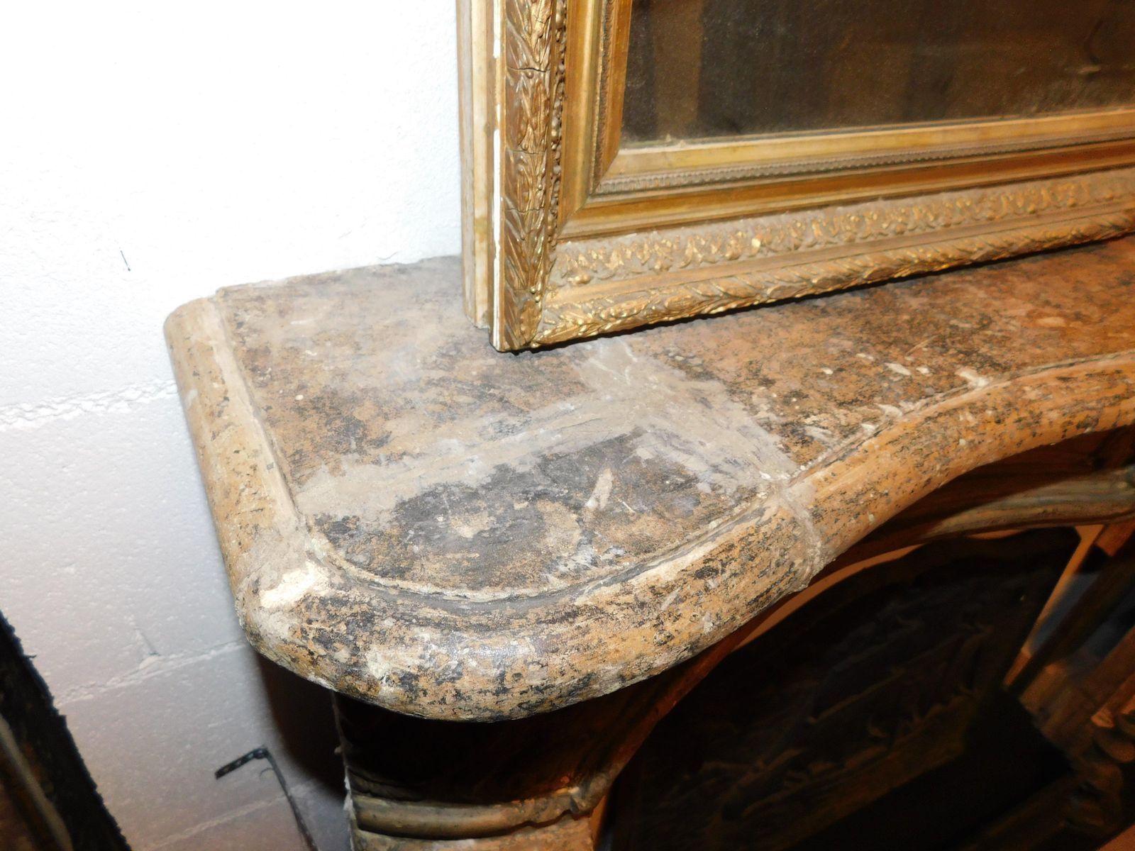 Home Fixtures Fireplace Mantle In Carved Burgundy Stone, France photo