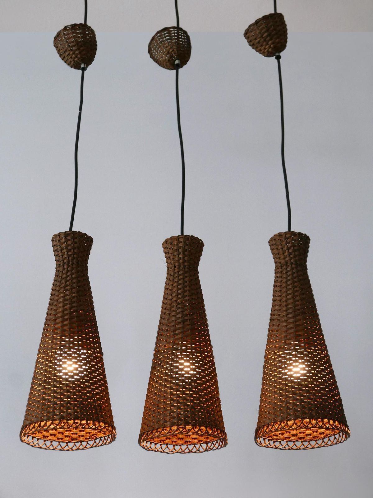 photo furniture Set Of Three Lovely Mid Century Modern Rattan Diabolo Pendant Lamps 1960s