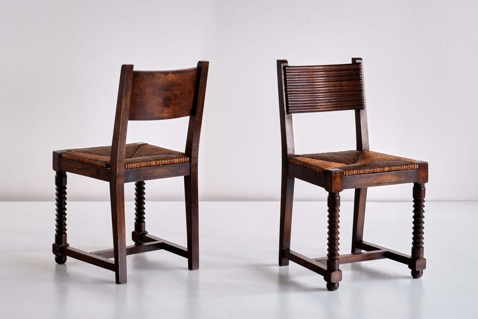 photo furniture Set Of Six Victor Courtray Dining Chairs In Oak And Rush, France, 1940s