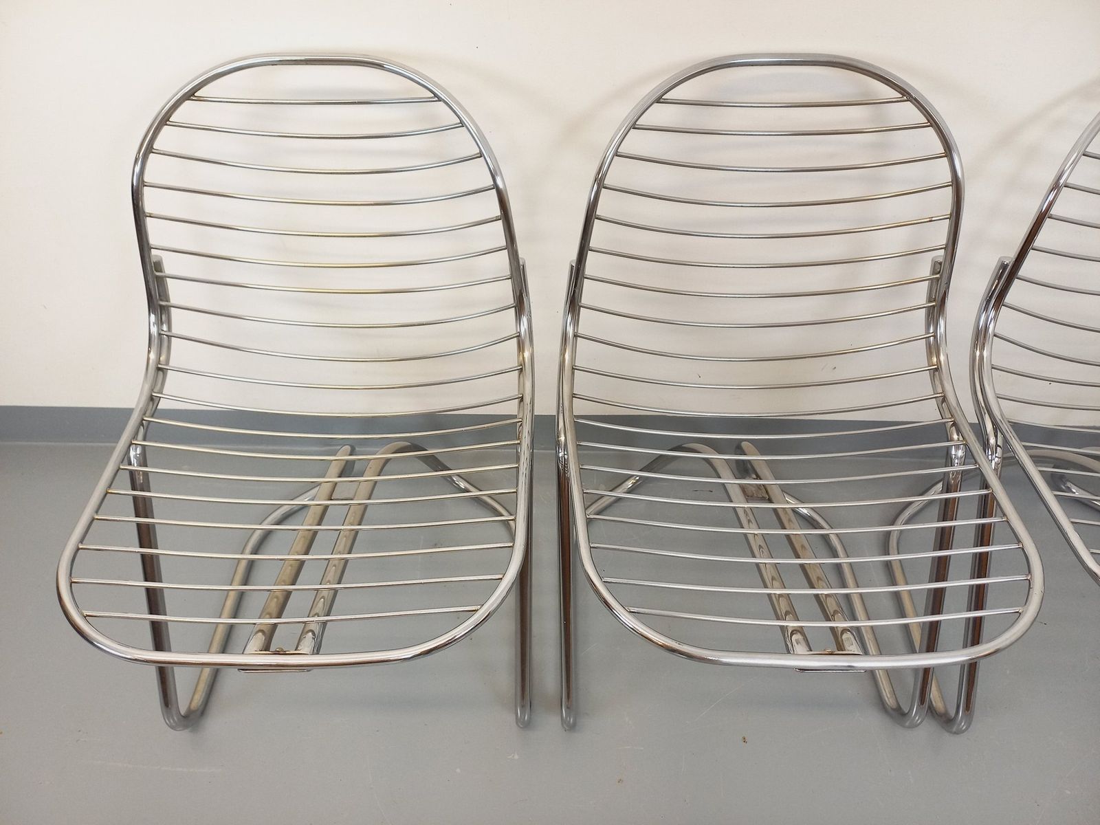 photo buy 4 Italian Gastone Rinaldi Chairs In Chromed Metal