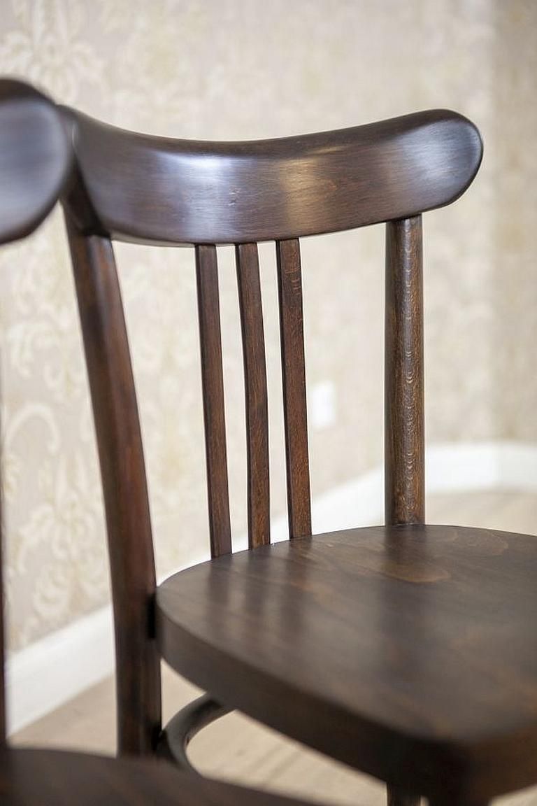 516.0 Two 20th Century Brown Beech Chairs In The Thonet Style photo