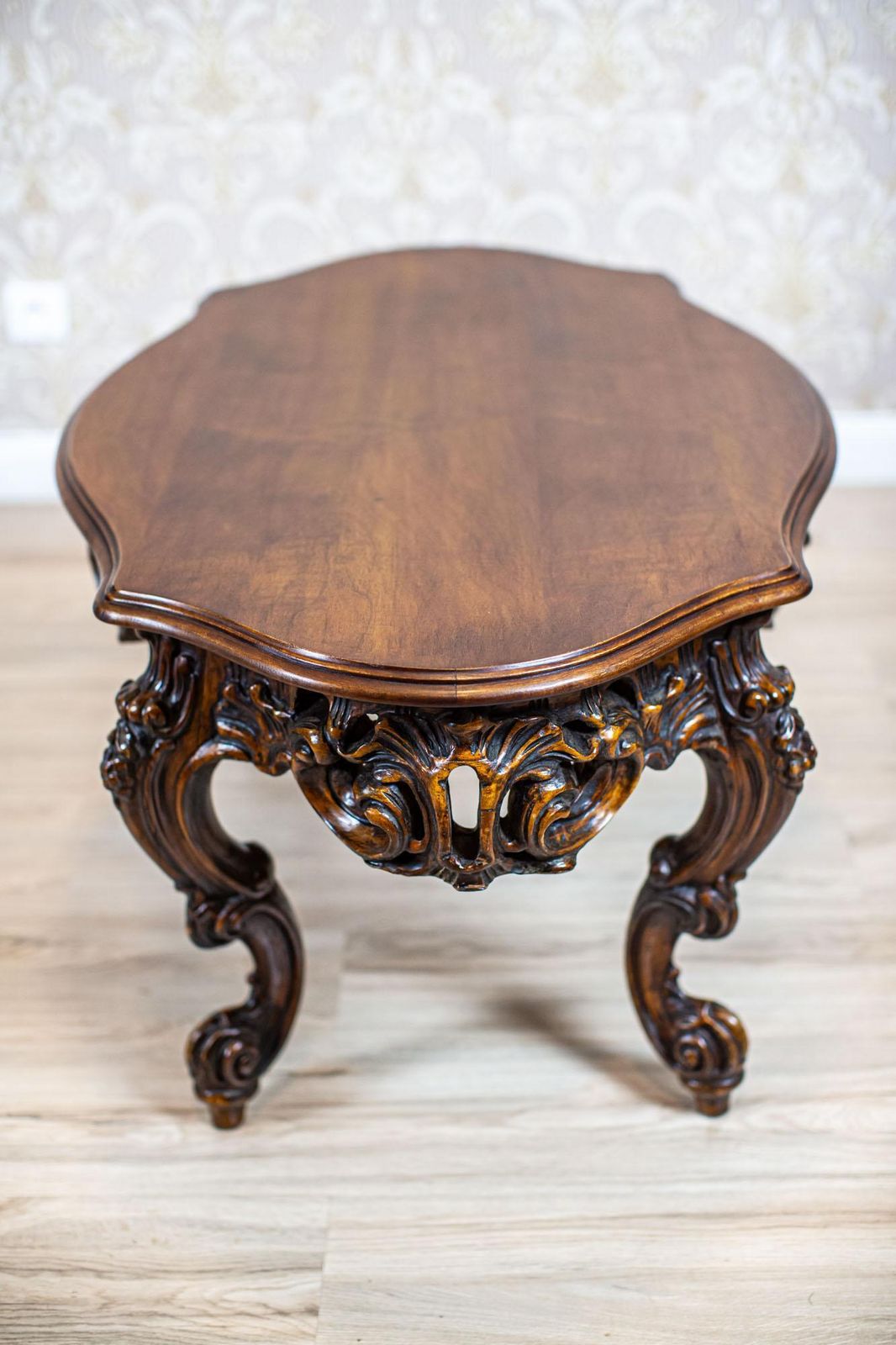 photo for sale Decorative Brown Coffee Table From The Mid 20th Century With Carved Apron