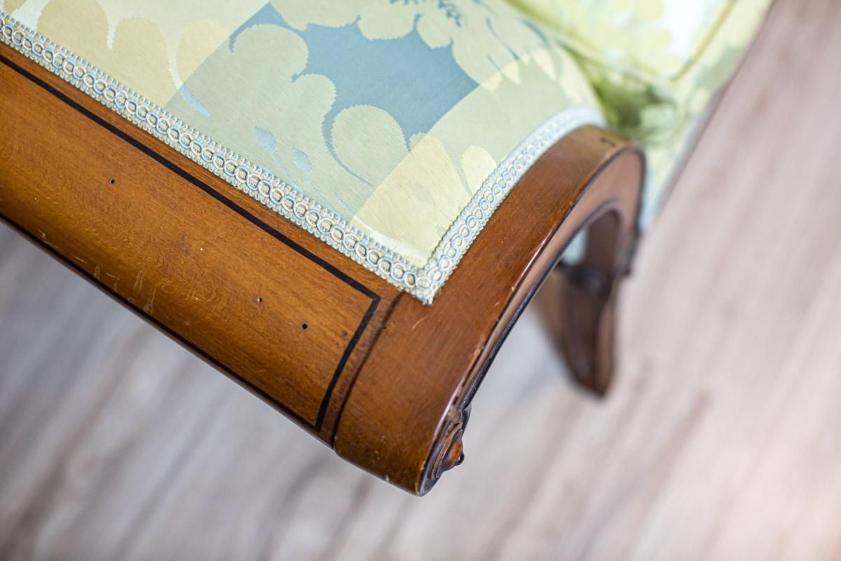 photo furniture Stylized Walnut Sofa From The Early 20th Century With New Upholstery