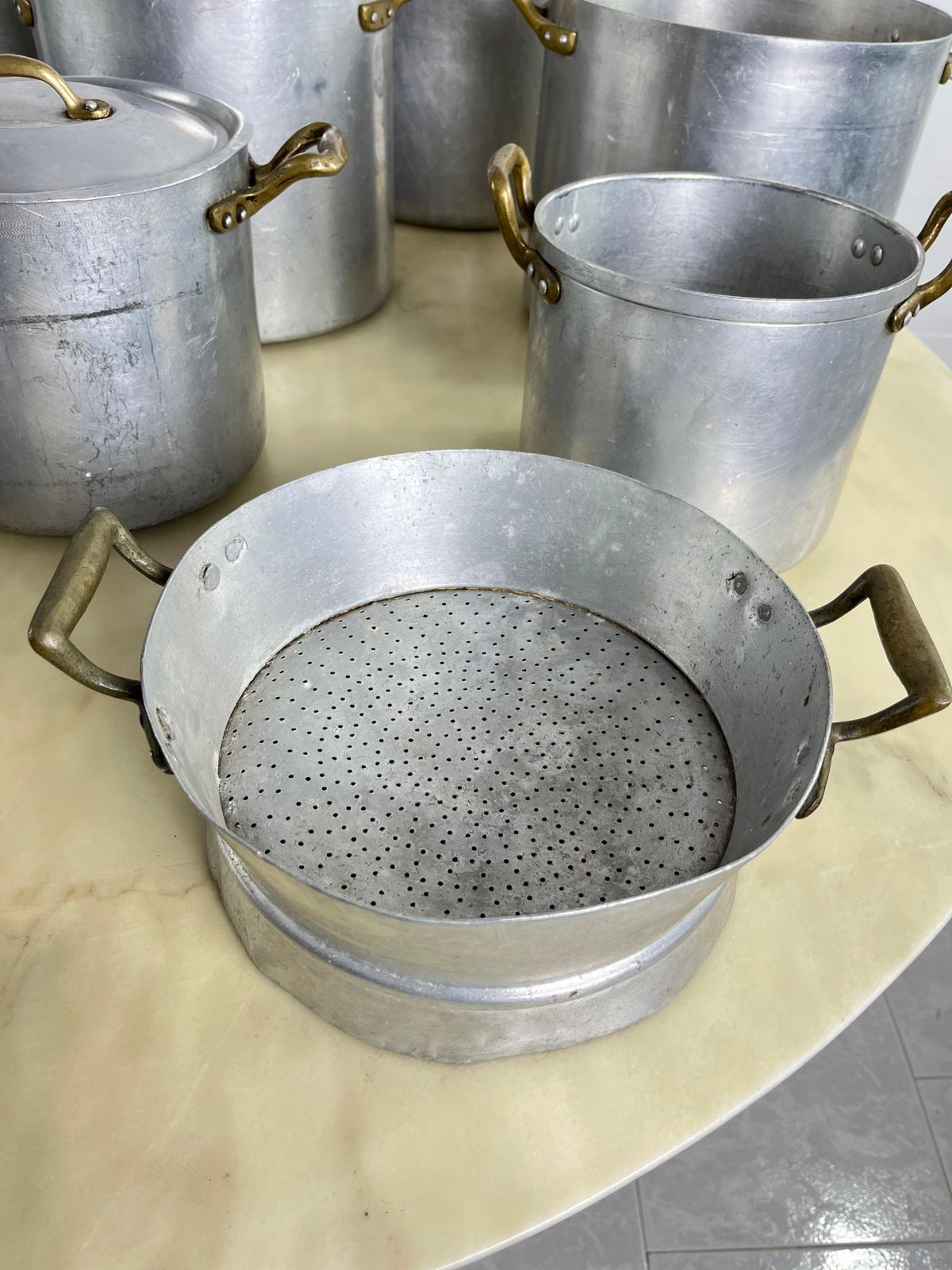 Set Of 10 Mid Century Aluminum And Brass Pots, Baking Pan And Sieve 1940s photo furniture