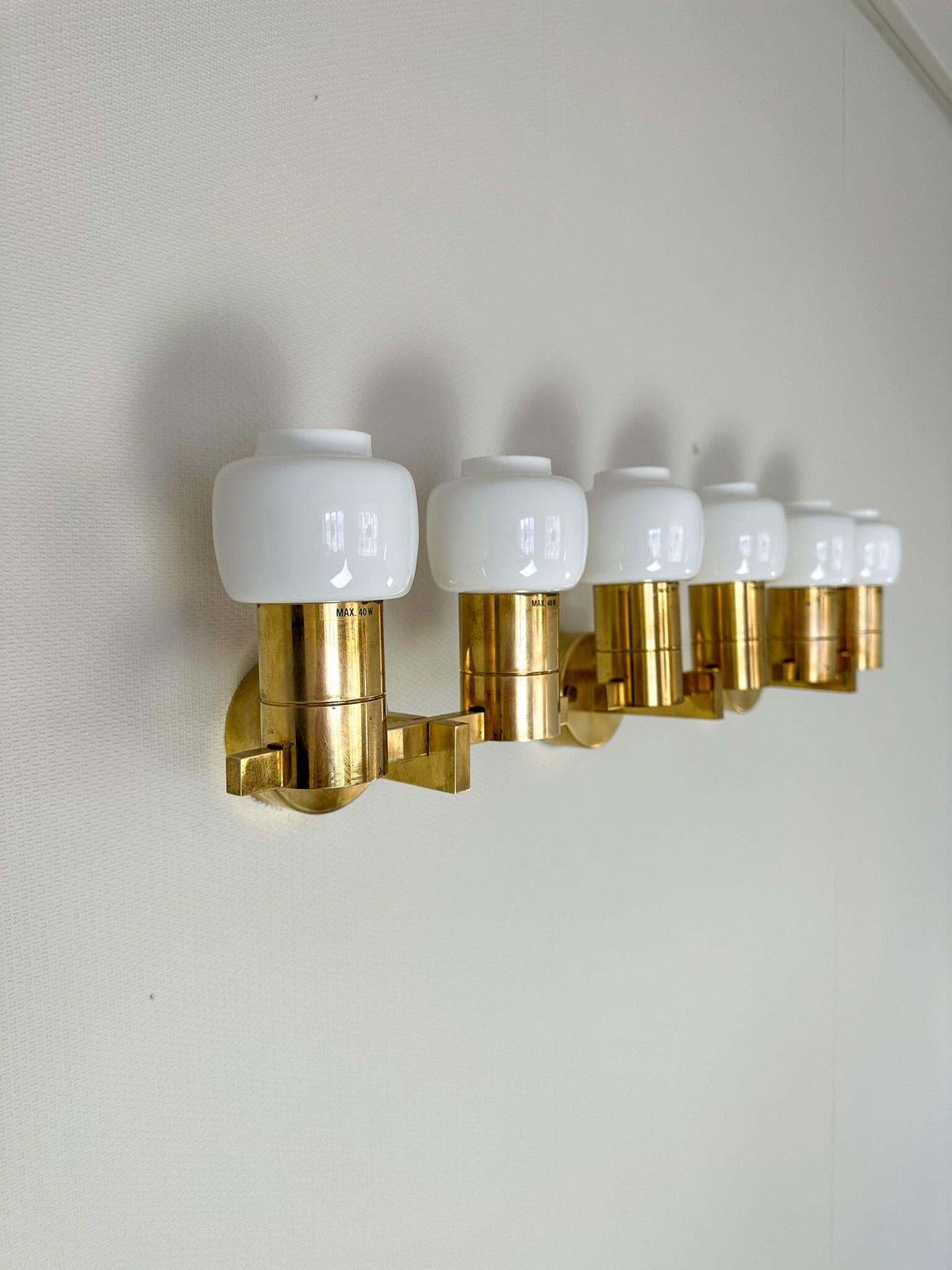 photo for sale Midcentury Hans Agne Jakobsson Brass And Opaline Glass Wall Lamps, Sweden, 1960s