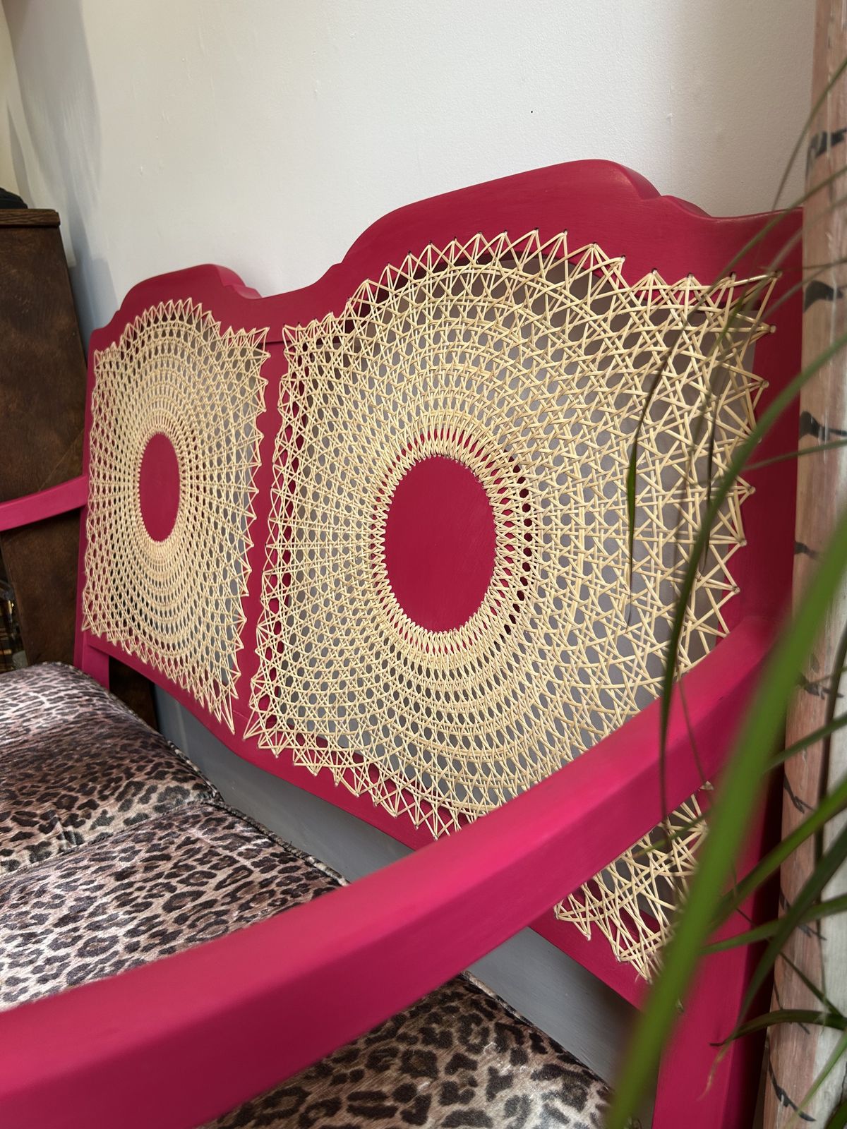 photo furniture Pink And Leopard Print Cane Two Seater Sofa