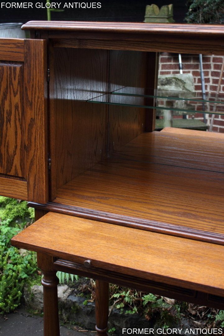 photo for sale A Jaycee Autumn Gold Carved Oak Drinks / Cocktail / Wine Cabinet