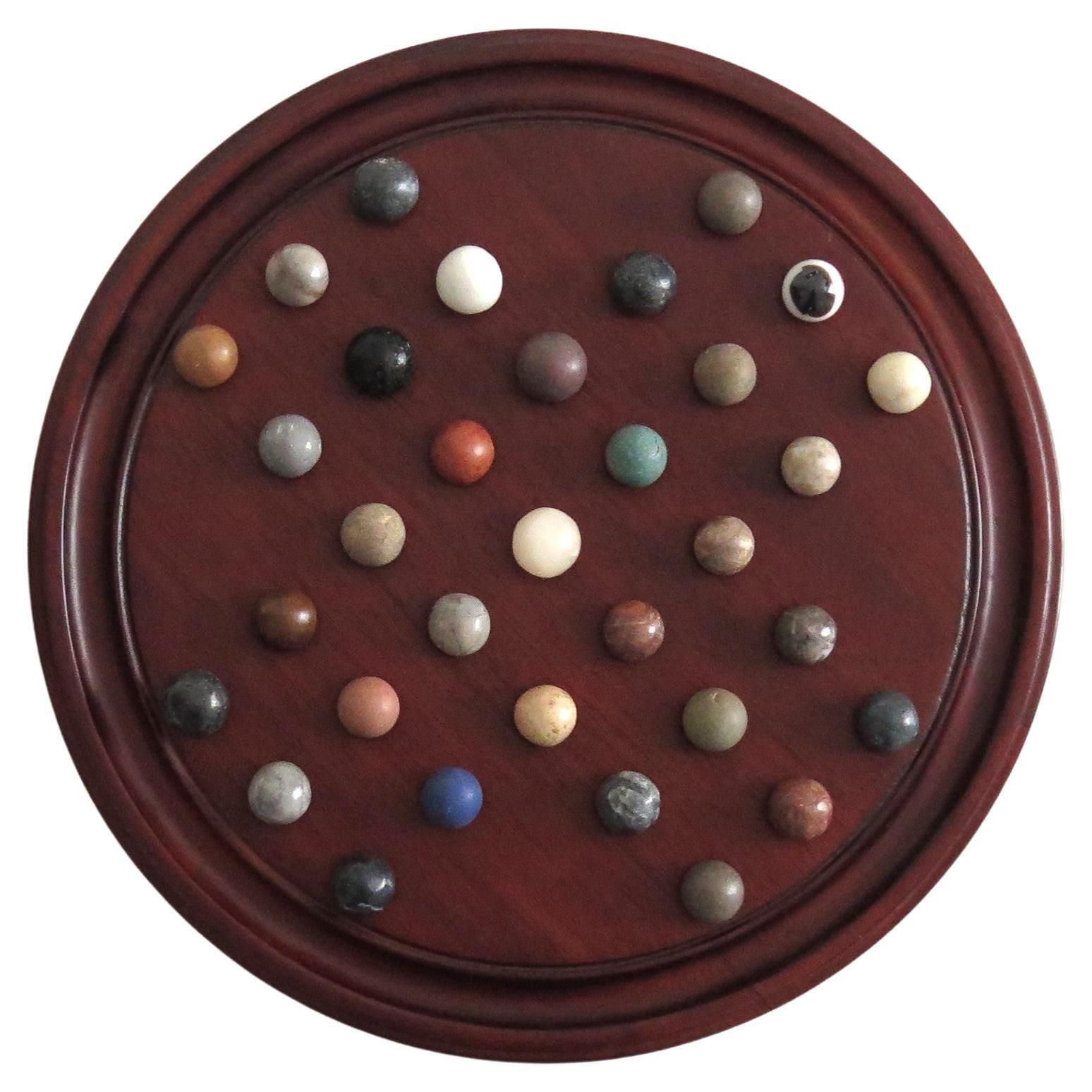 Marble Solitaire Game 10 Inch Hardwood Board 35 Mixed Stone Marbles, Circa 1945