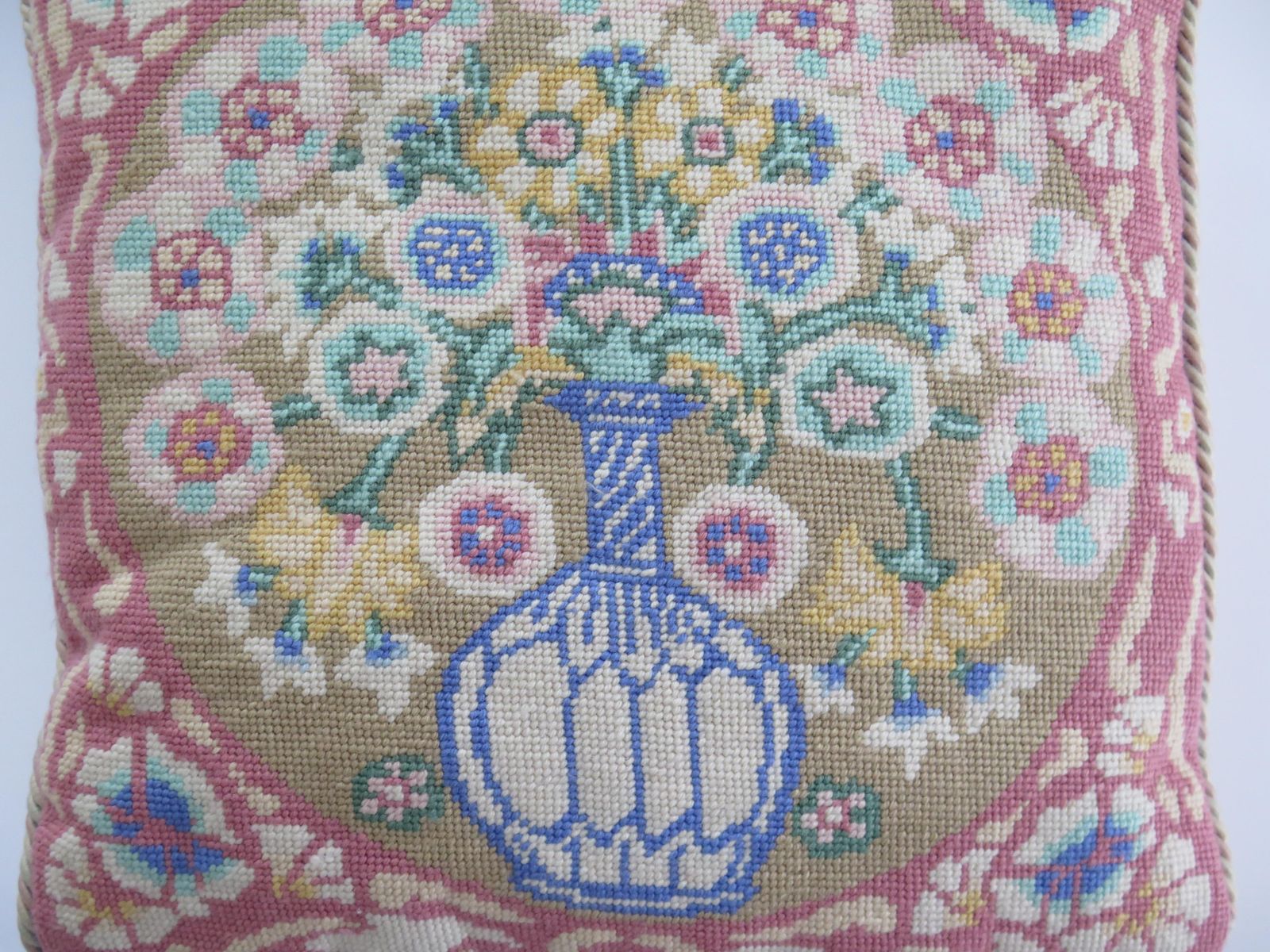 photo furniture Woven Cushion Or Pillow With Flower Vase Pattern In Pastel Shades, Circa 1930s