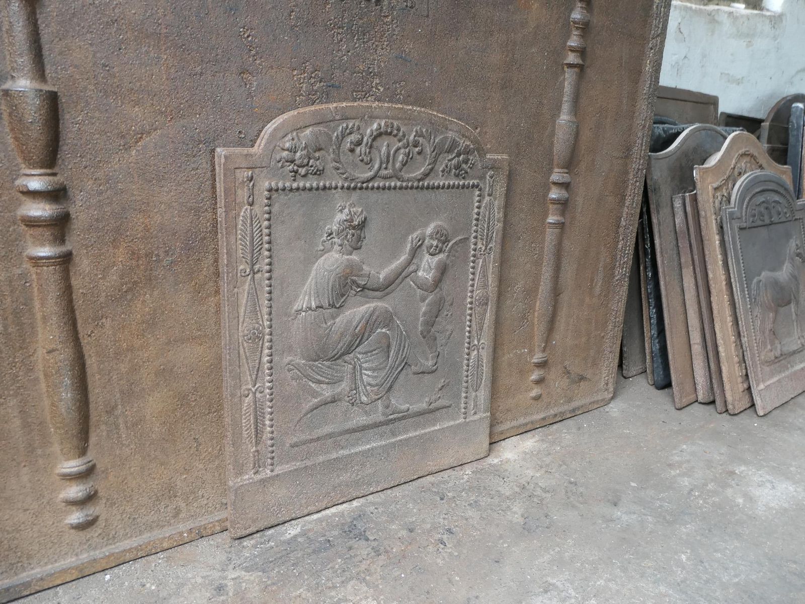 Home Fixtures Small French Neoclassical Period 'Woman With Cupid' Fireback / Backsplash photo