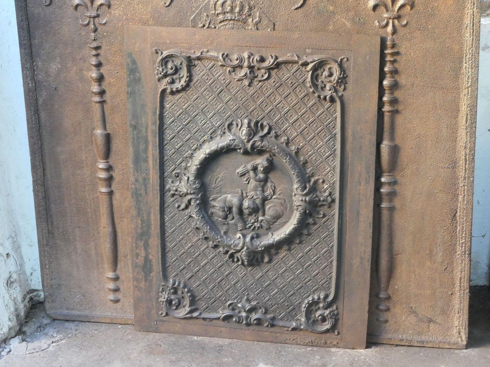 French Early 20th Century Louis XV Style 'Cupids' Fireback / Backsplash. photo for sale