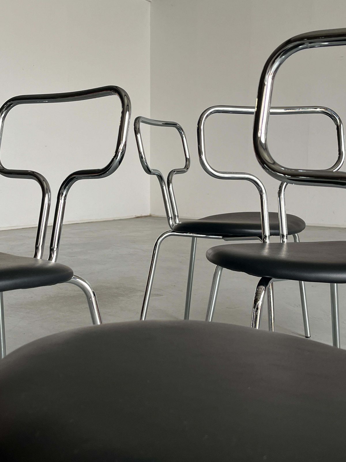 Bauhaus Design Curved Chrome Tubular Steel And Faux Leather Dining Chairs photo buy