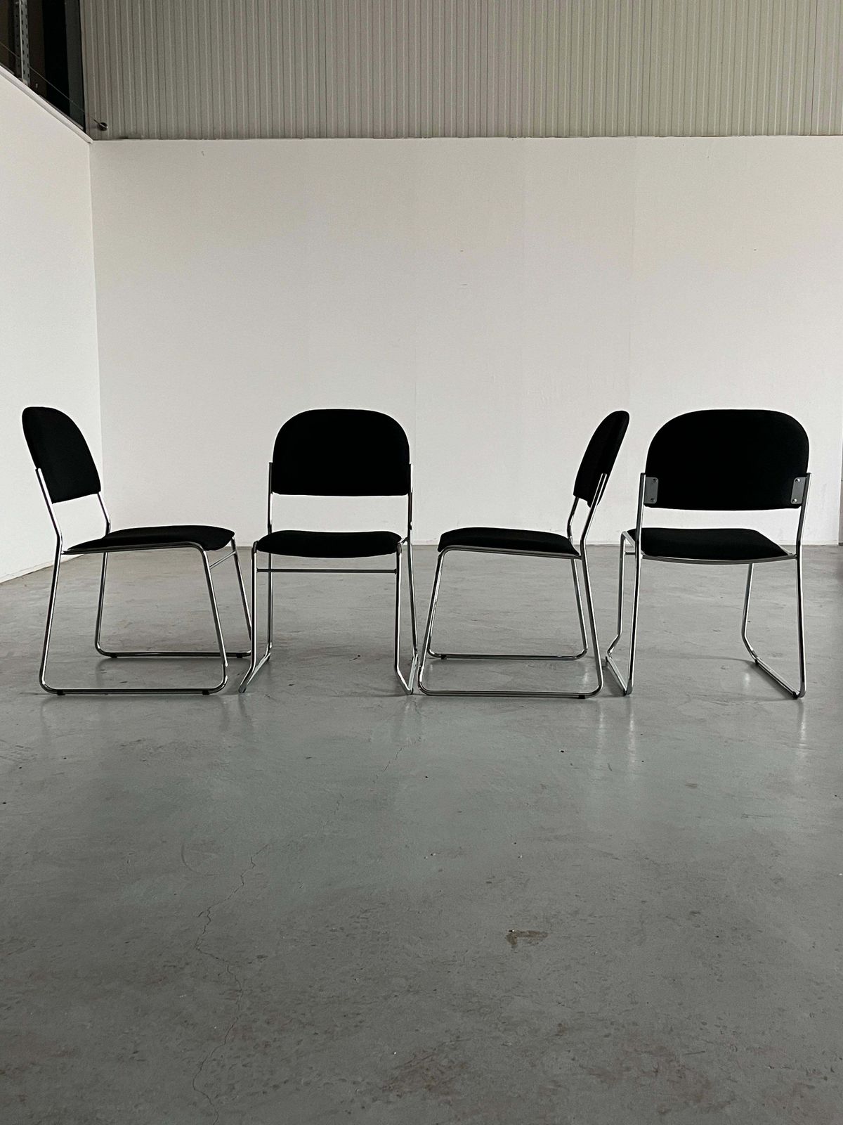 Set Of 4 Minimalist Dining Chairs In Black Fabric And Chromed Steel, Stackable photo Furniture
