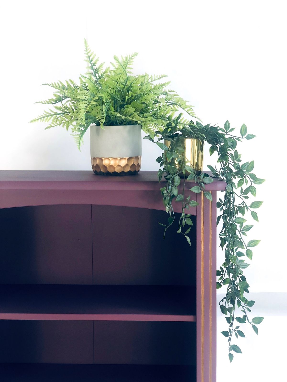 photo furniture Painted Purple Bookshelf With Gold Trim Detail