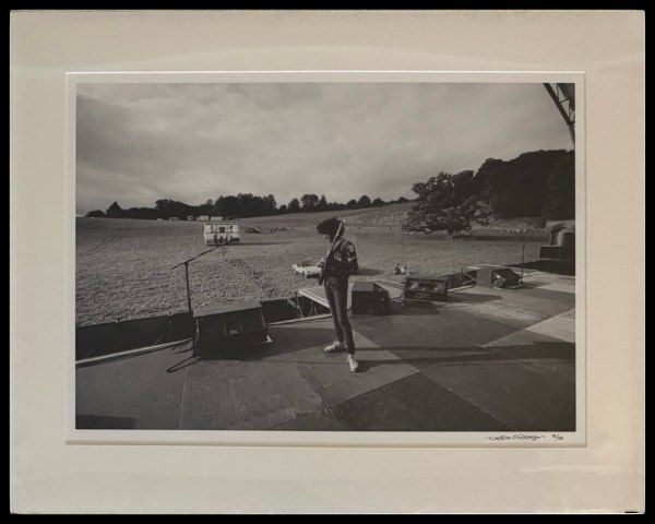 Denis O’ Regan Signed Photograph – Phil Lynott, Thin Lizzy Soundcheck At Slane Castle (3/12)