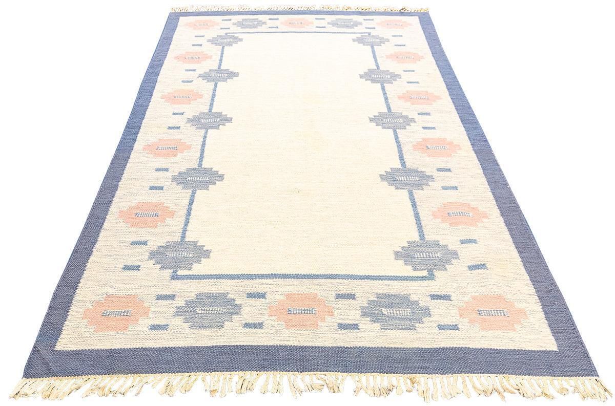 Scandinavian Rug Rollakan Soft Color Palette photo Textiles