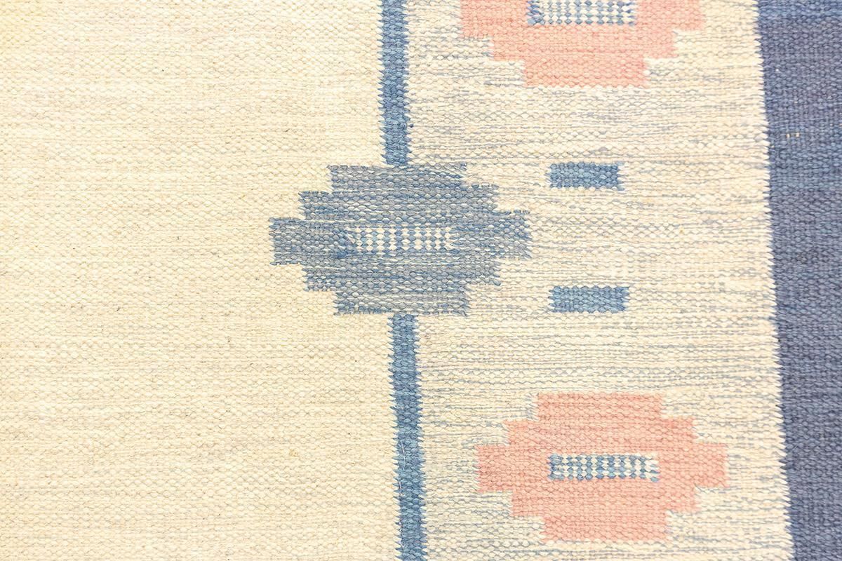 Scandinavian Rug Rollakan Soft Color Palette photo vinterior