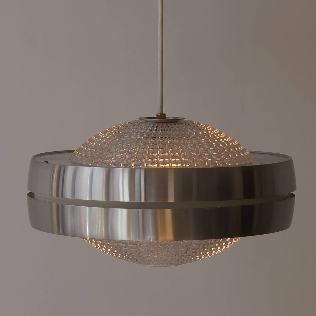 Four Raak Ufo Shaped Pendant Lights In Glass And Aluminum photo Lighting
