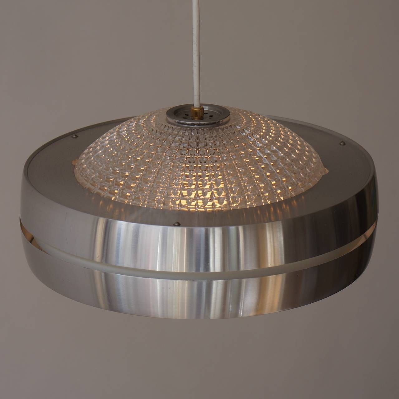 Four Raak Ufo Shaped Pendant Lights In Glass And Aluminum photo vinterior