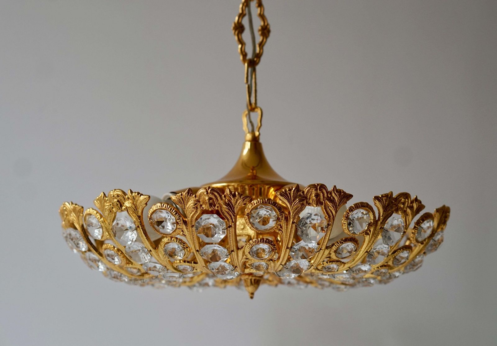 photo for sale Hollywood Regency Crystal And Gilded Chandelier By Palwa