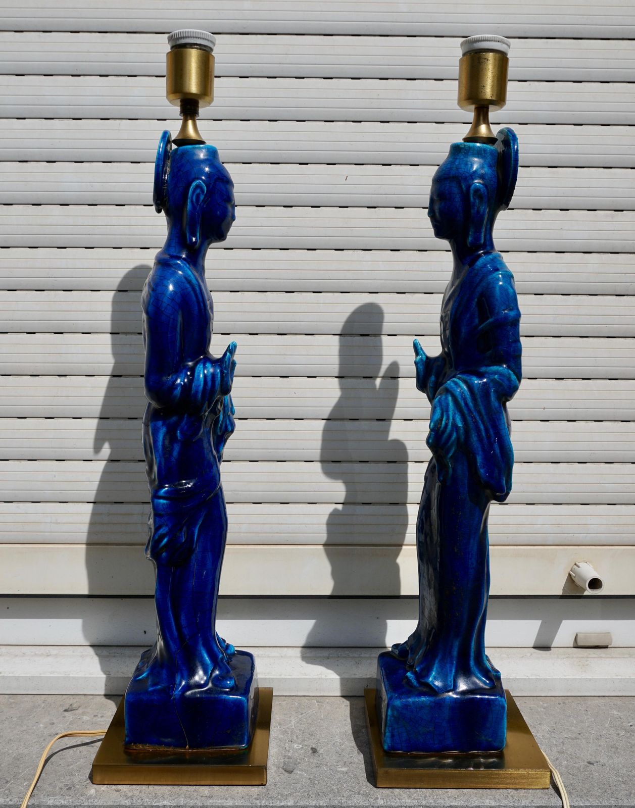 photo for sale Pair Of Hollywood Regency Standing Buddha Ceramic Table Lamps By Ugo Zaccagnini