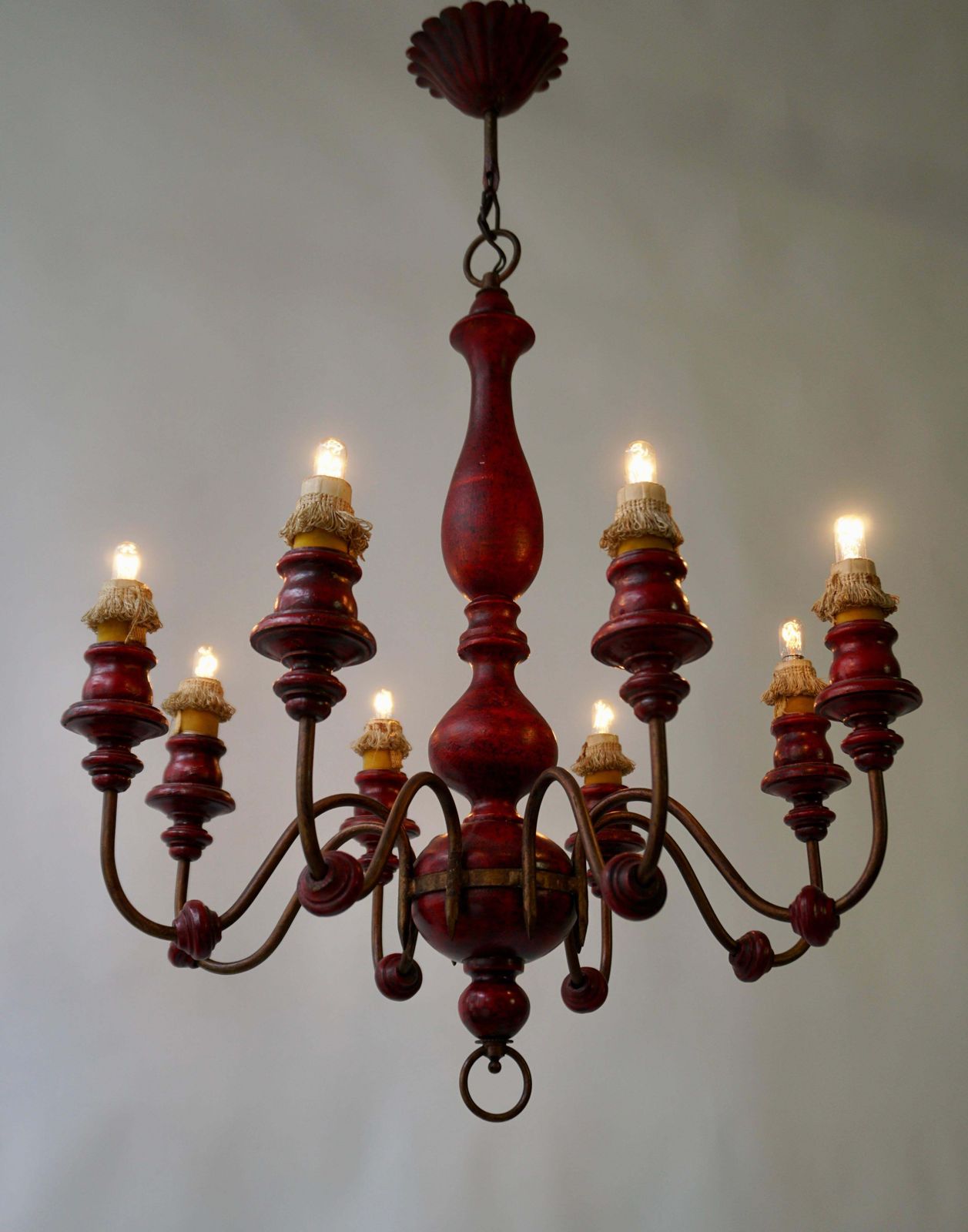 Eight Light Red Painted Wood And Iron Chandelier photo for sale