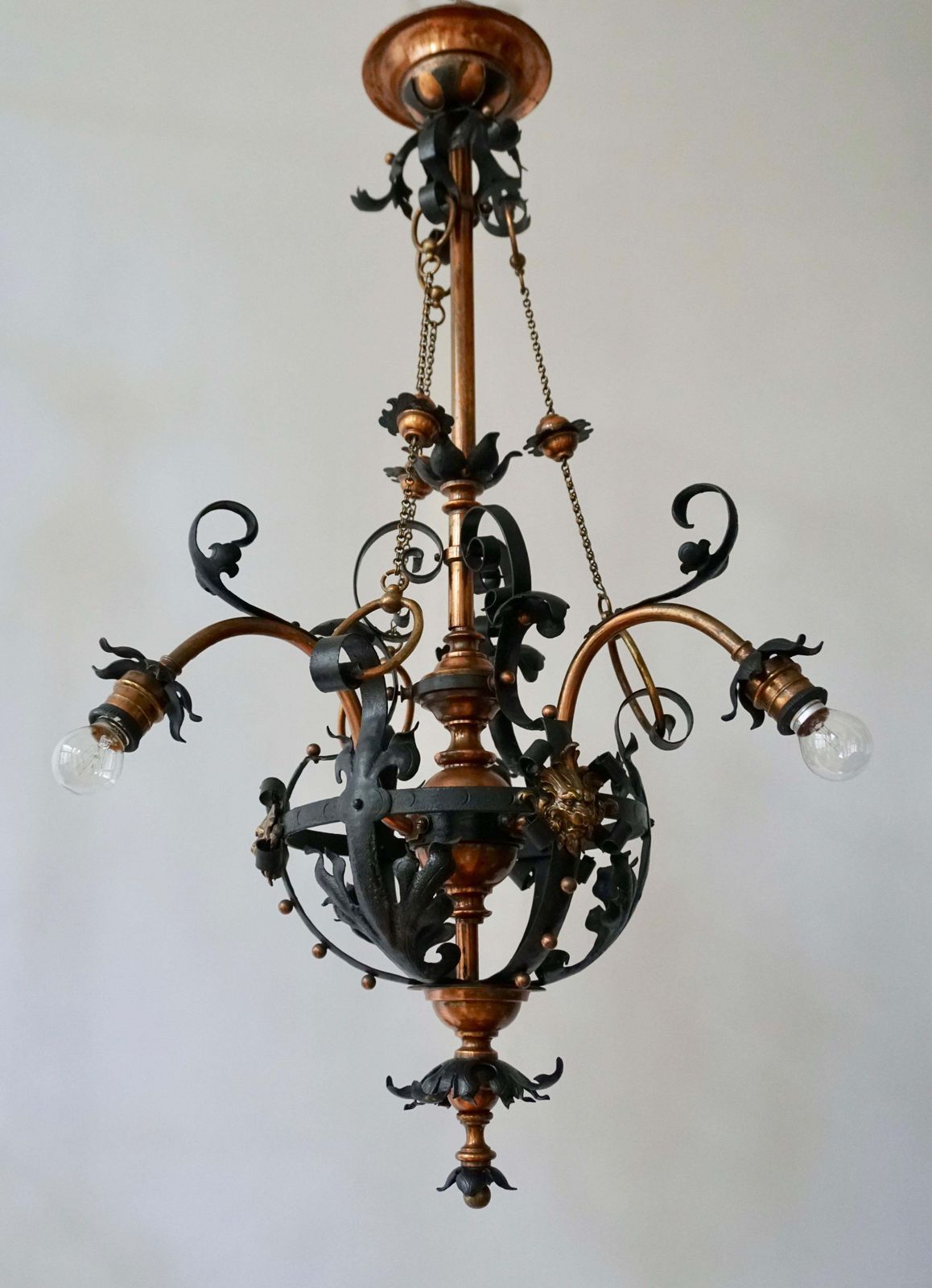 Arts & Crafts Wrought Iron And Copper Castle Chandelier With Bronze Lion Heads photo furniture