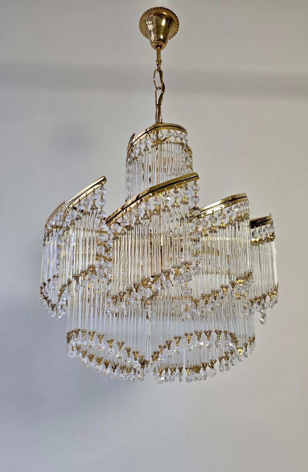 photo furniture Spectacular Italian Chandelier – Undulating Elegance In Glass And Brass, 1970s