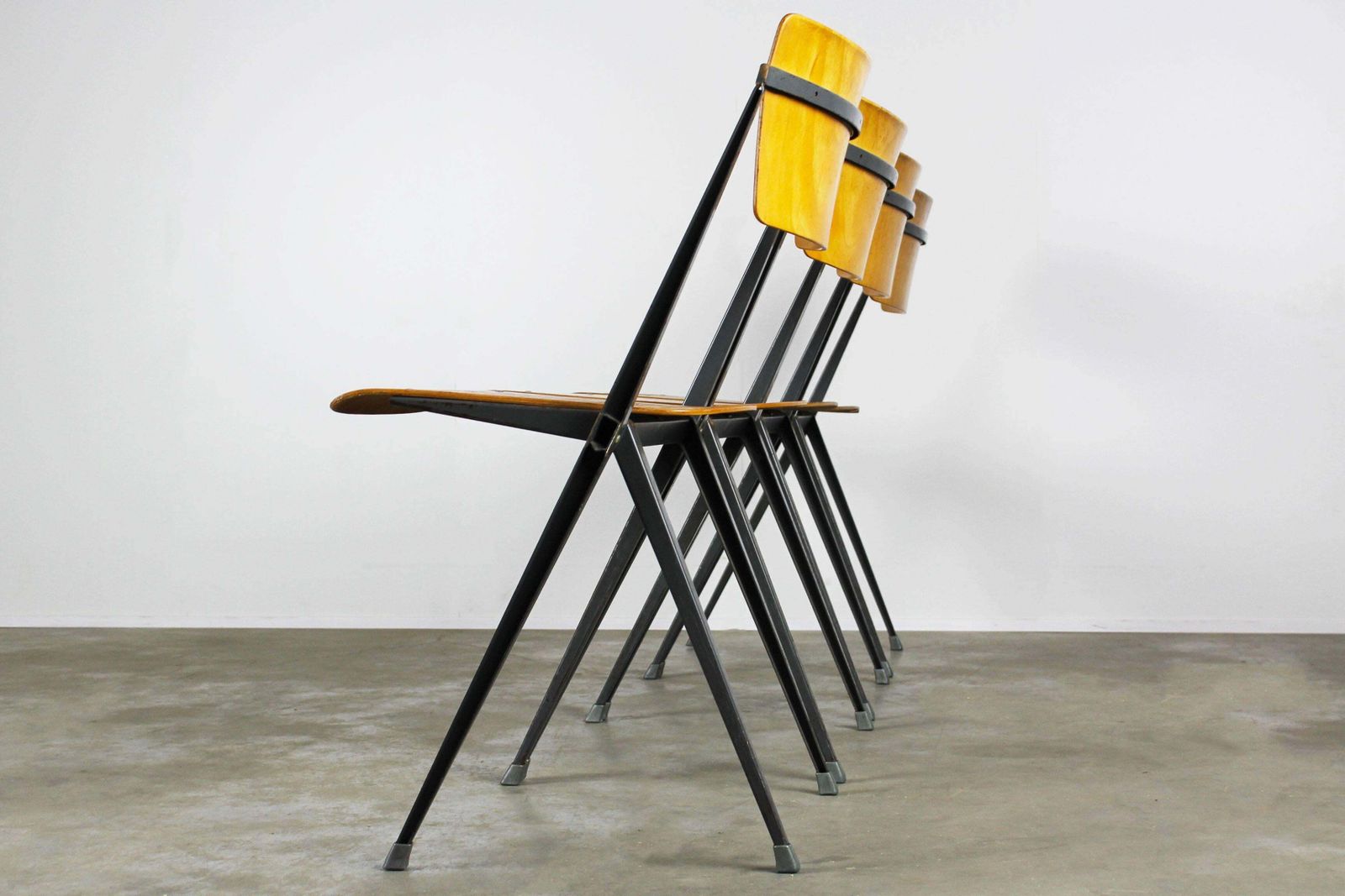 Set Of Four Pyramid Chairs Designed By Wim Rietveld For Ahrend De Cirkel, 1963 photo vinterior