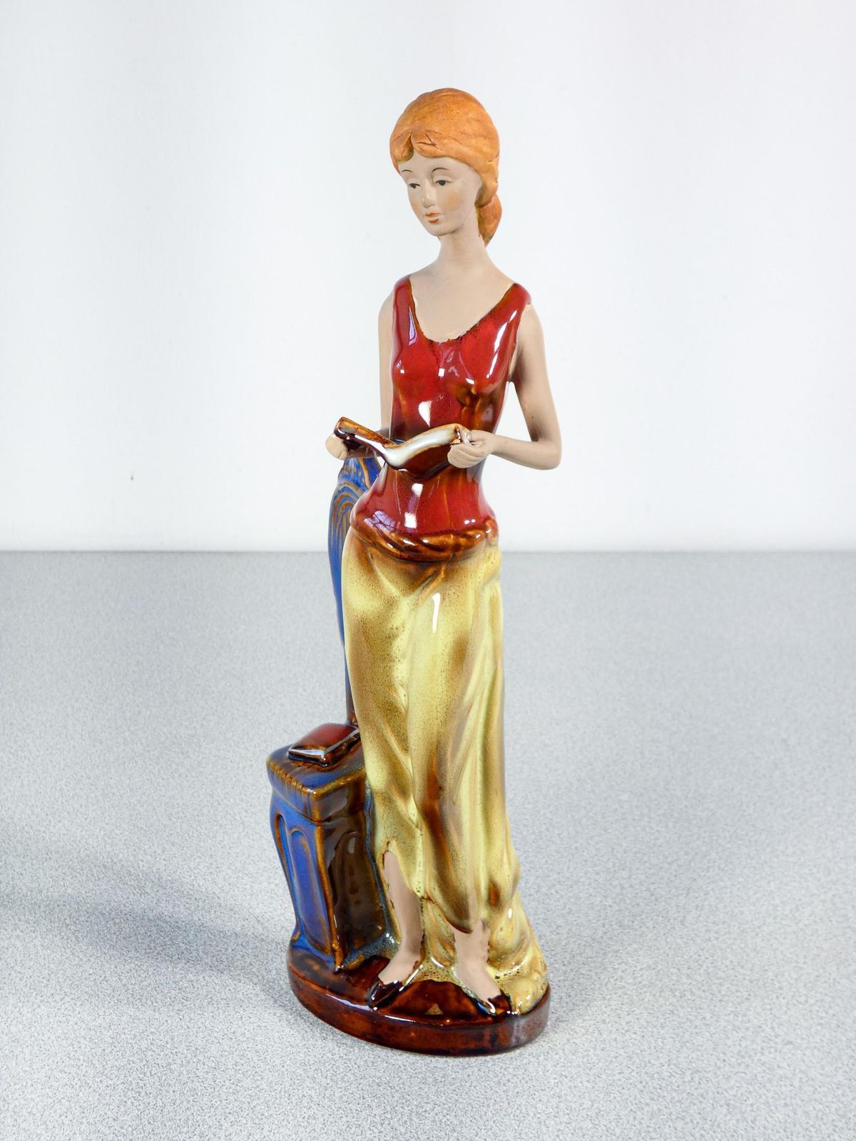 Painted And Glazed Ceramic Sculpture. Woman With Books. Italy photo 179.0