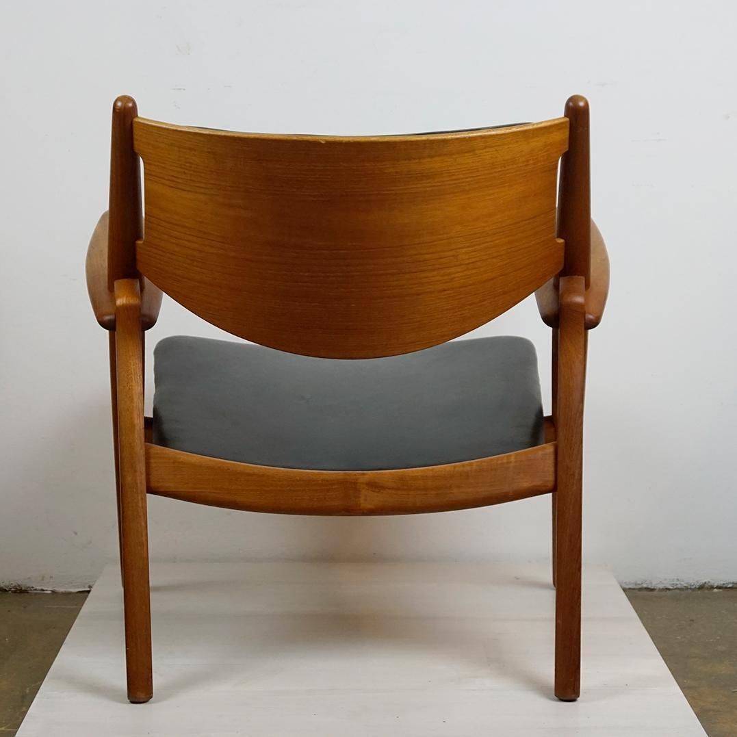 Scandinavian Teak And Black Leather Ch28 Chair By Hans Wegner For Carl Hansen photo vintage