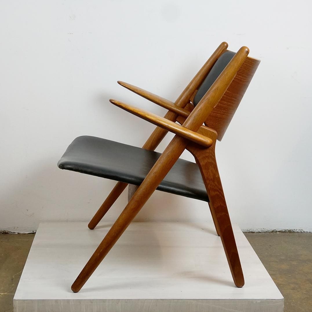 Furniture Scandinavian Teak And Black Leather Ch28 Chair By Hans Wegner For Carl Hansen photo
